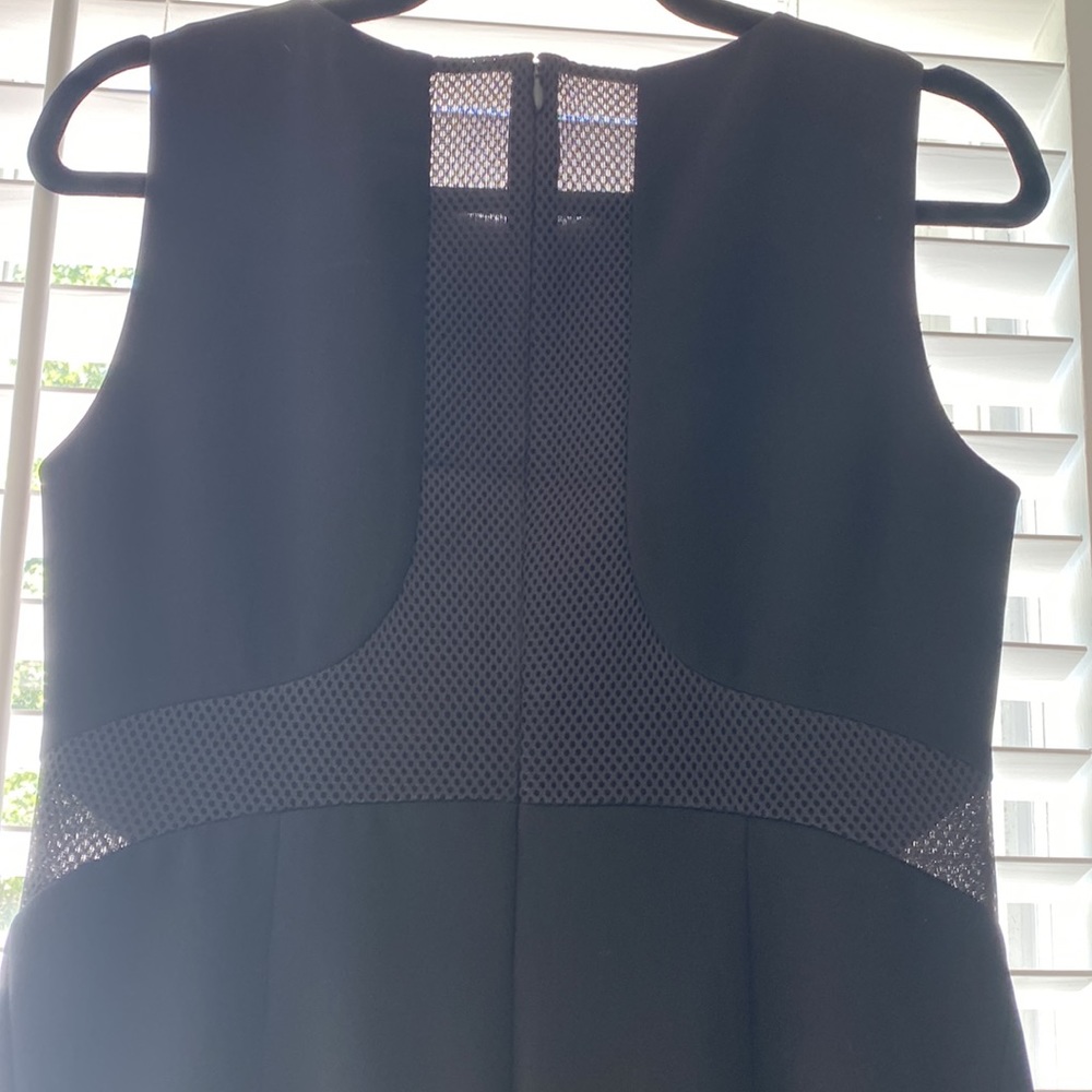 NWT Lafayette 148 black dress with cutout sides and back. Size 4.